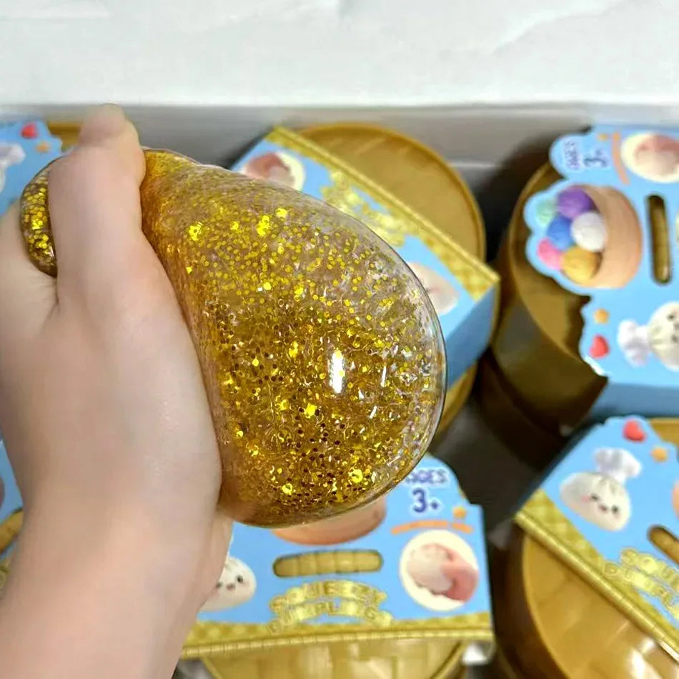 Squishy Dumpling - Ravioli squishy mystère - Squishy à paillettes - Squishy anti stress